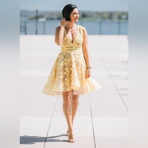 NEVER WORN sleeveless yellow and nude floral Nadine Merabi spring 2024 dress.